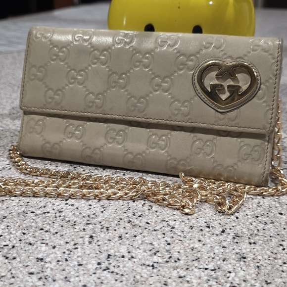 Gucci Handbags - Gucci Guccissima Wallet In Ivory. Comes With Unbranded Chain